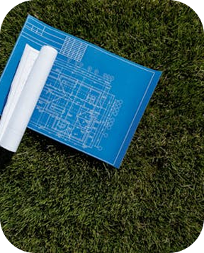 Foto van bouwplannen in grass